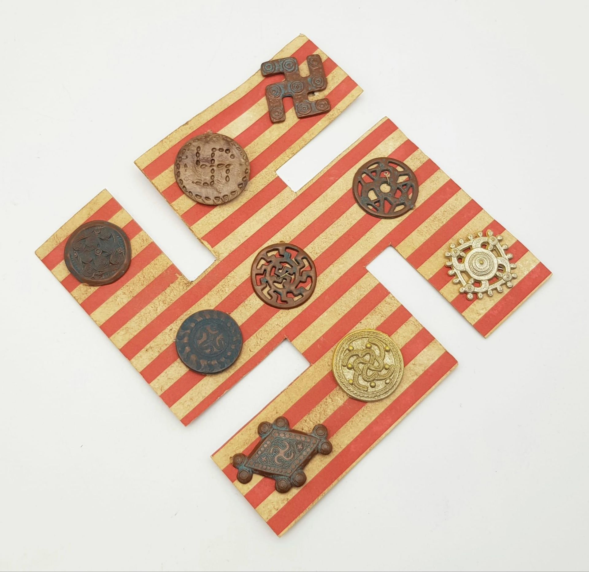 3rd Reich Archaeology Set of Winterhilf Tinnie Badges. The set of 9 badges are a portrayal of pre-