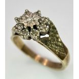 A vintage, 9 K yellow gold ring with a cluster of diamonds. Size: N, weight: 3.4 g.
