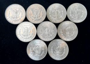 A Collection of Nine Silver One Dollar Coins - 1878, 79, 82, 84, 85, 86, 87, 88 and 98. Please see