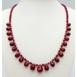 A Ruby Beaded Necklace with Ruby Teardrops and 925 Silver Clasp. 160ctw rubies, 46cm length, 31.