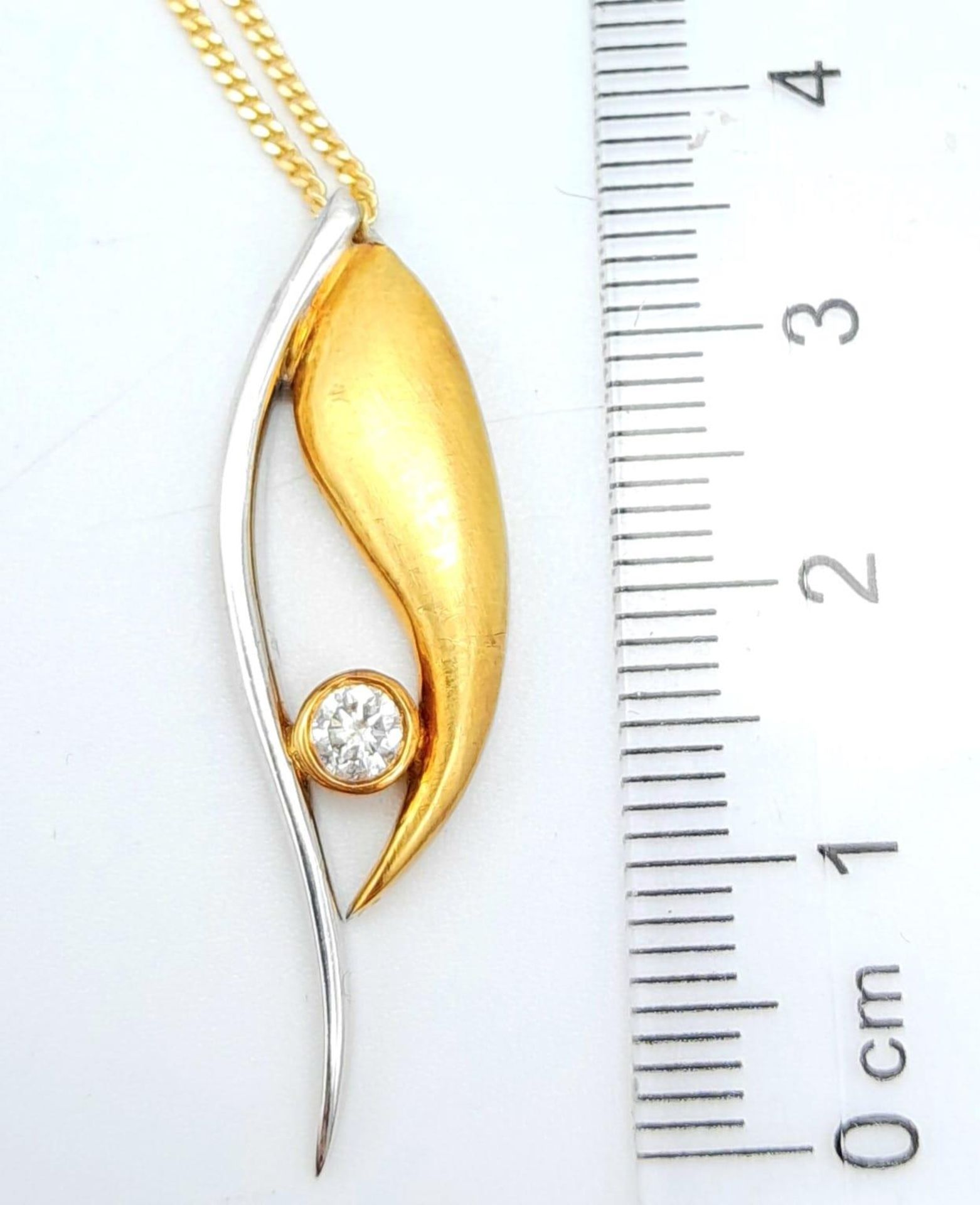 An 18K Bi Colour Gold Diamond Pendant on an 18K Yellow Gold Disappearing Necklace. 0.15ct diamond. - Image 6 of 11