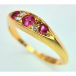 An Antique 18K Yellow Gold Diamond and Red Stone Ring. One small diamond missing. Chester hallmarks.