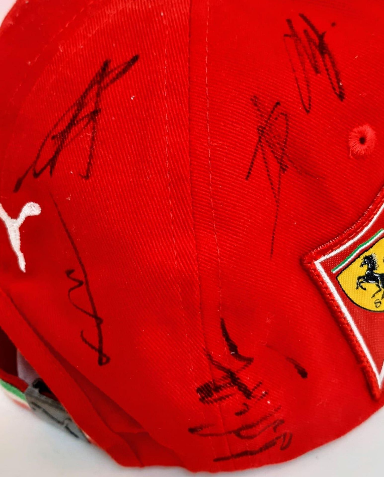An Official Ferrari Team Cap - Over 20 signatures including Ferrari drivers and team principals. - Image 11 of 14
