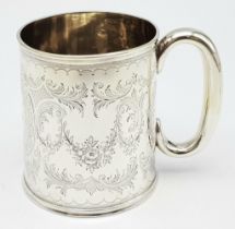 AN ANTIQUE SILVER TANKARD INSCRIBED "PHILIP OCTOBER 23rd 1894" ALL HAND ENGRAVED BY A MASTER