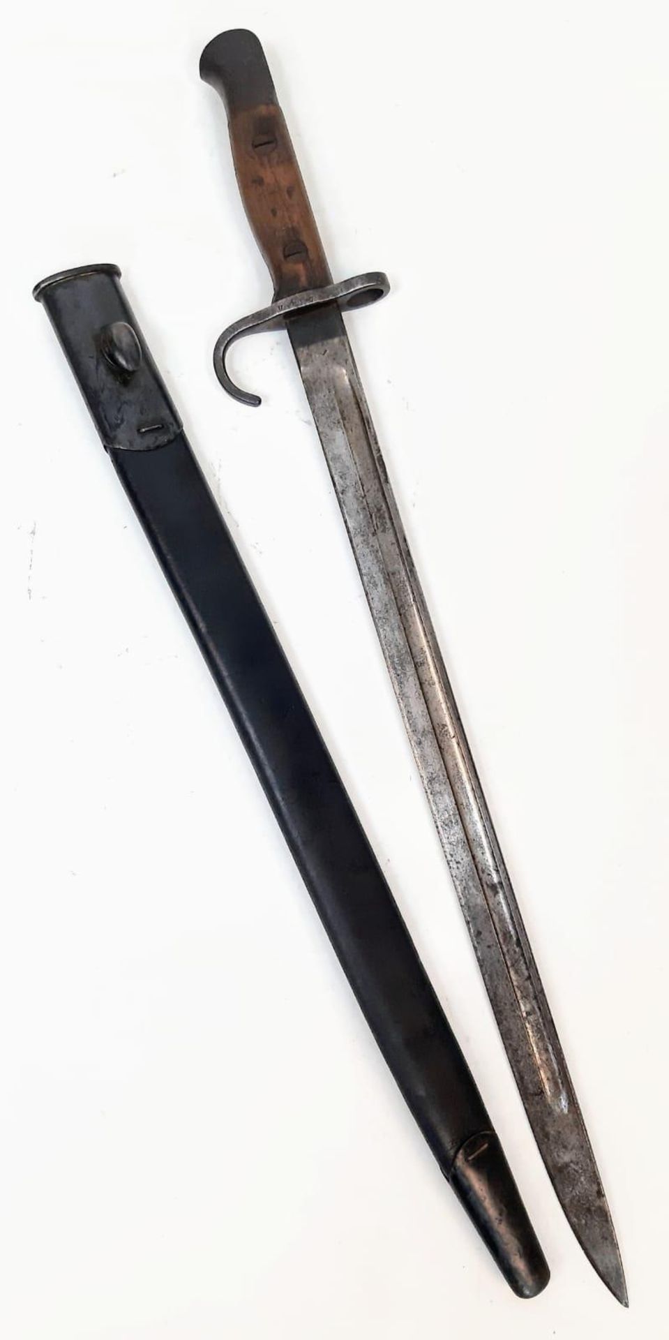 1907 Pattern Hooked Quillon Bayonet, Dated 1909. Maker Sanderson. Unit marking on the Ricasso.