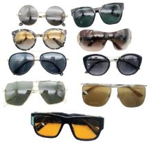 Nine Pairs of Designer Ladies Sunglasses! Includes: Versace, Dolce and Gabbana(case), Burberry,