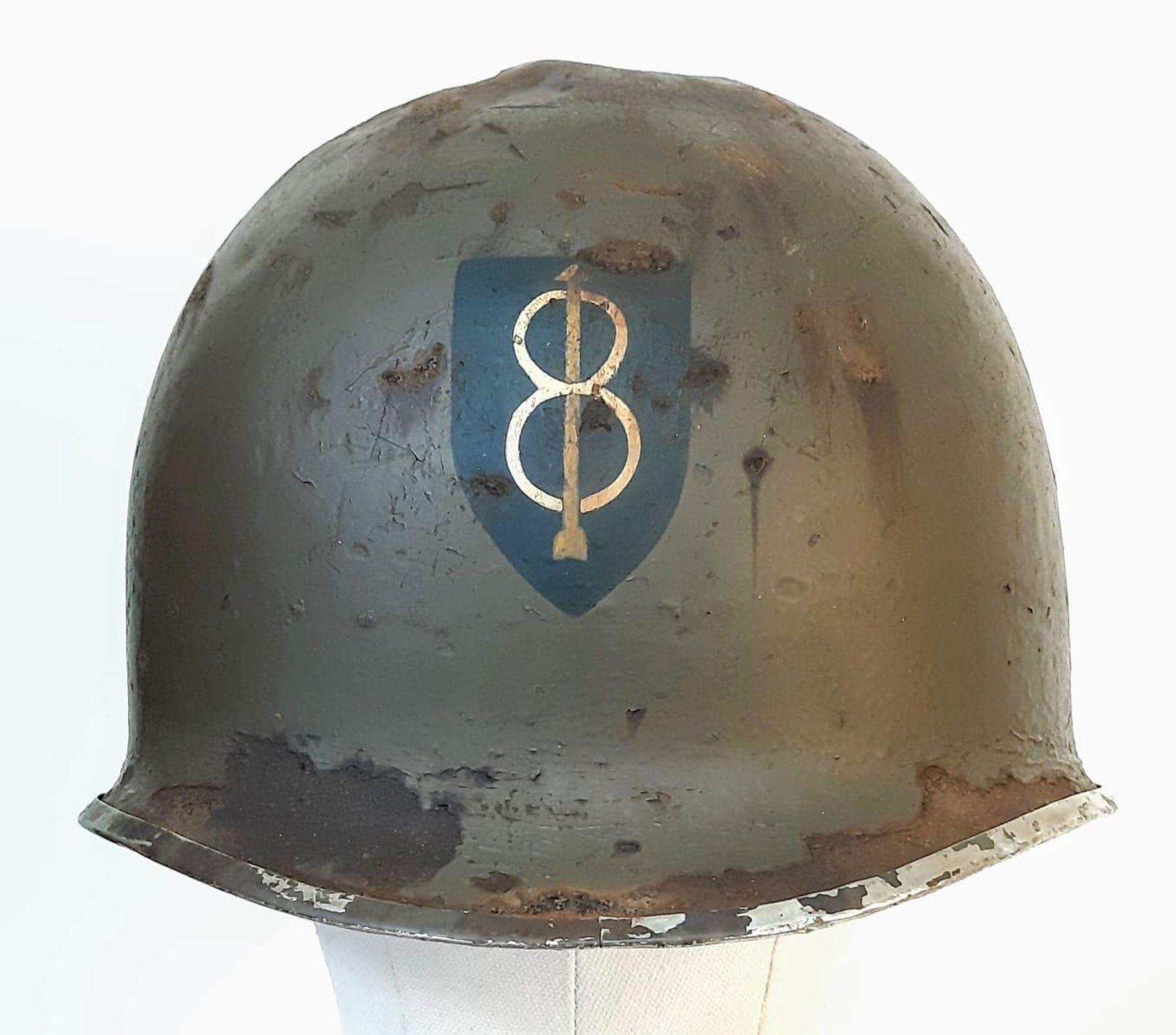 WW2 US M1 Swivel Bale Helmet, with insignia of the 8 th Infantry Division. This helmet has the