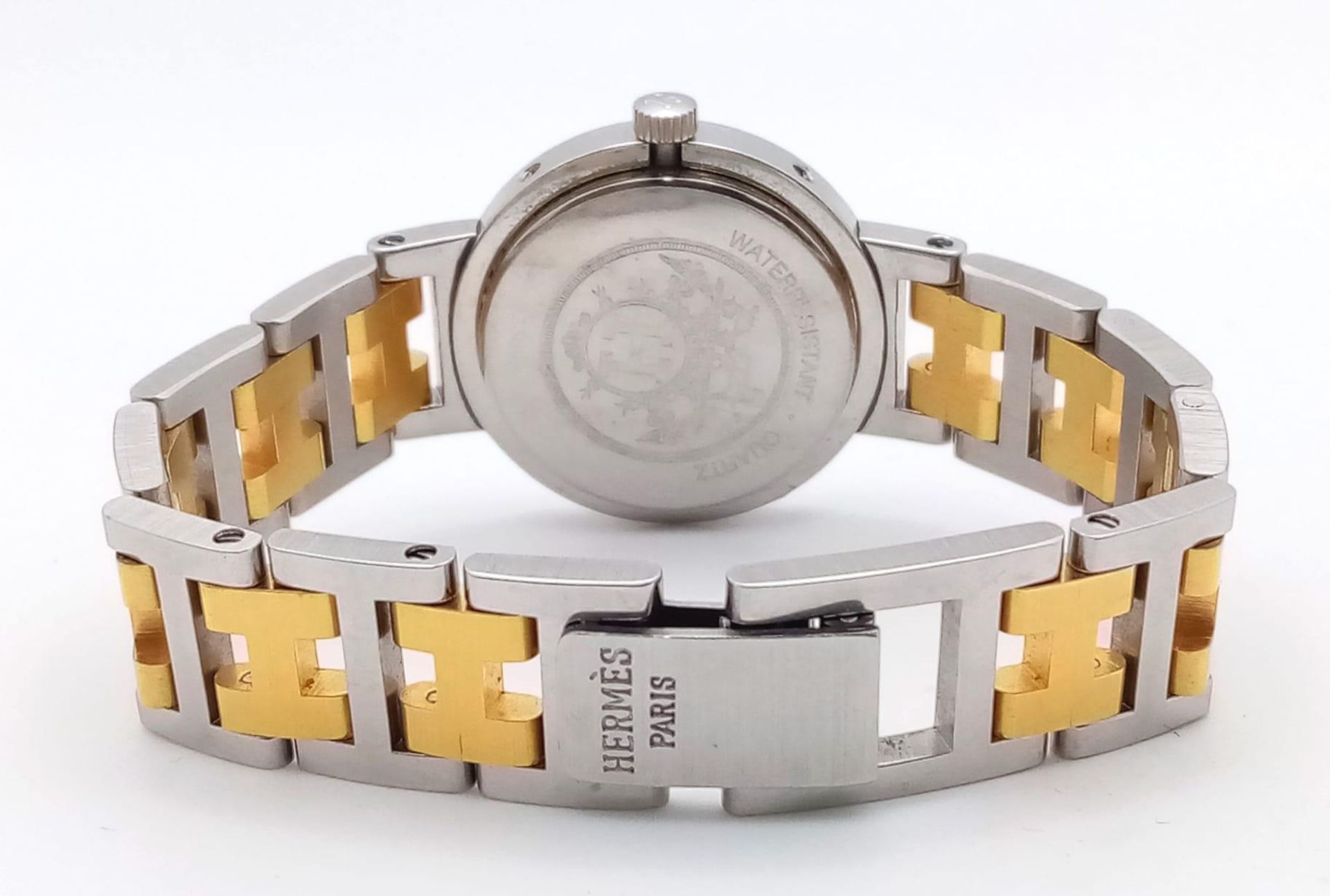 A Designer Hermes Quartz Ladies Watch. Two tone stainless steel bracelet and case - 25m. White - Bild 2 aus 5