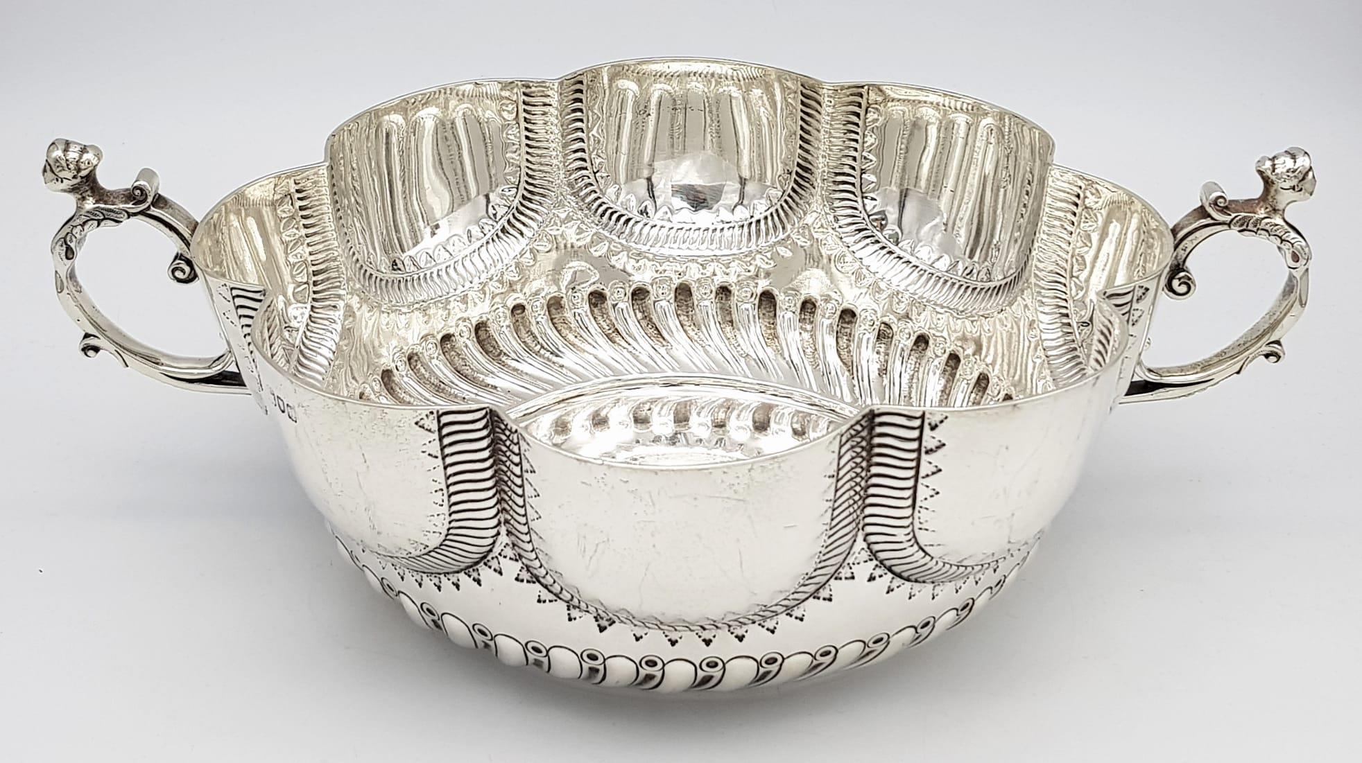 A BEAUTIFULLY ORNATE HAND ENGRAVED SOLID SILVER PUNCH BOWL MADE BY LAMBERT OF COVENTRY STREET ,