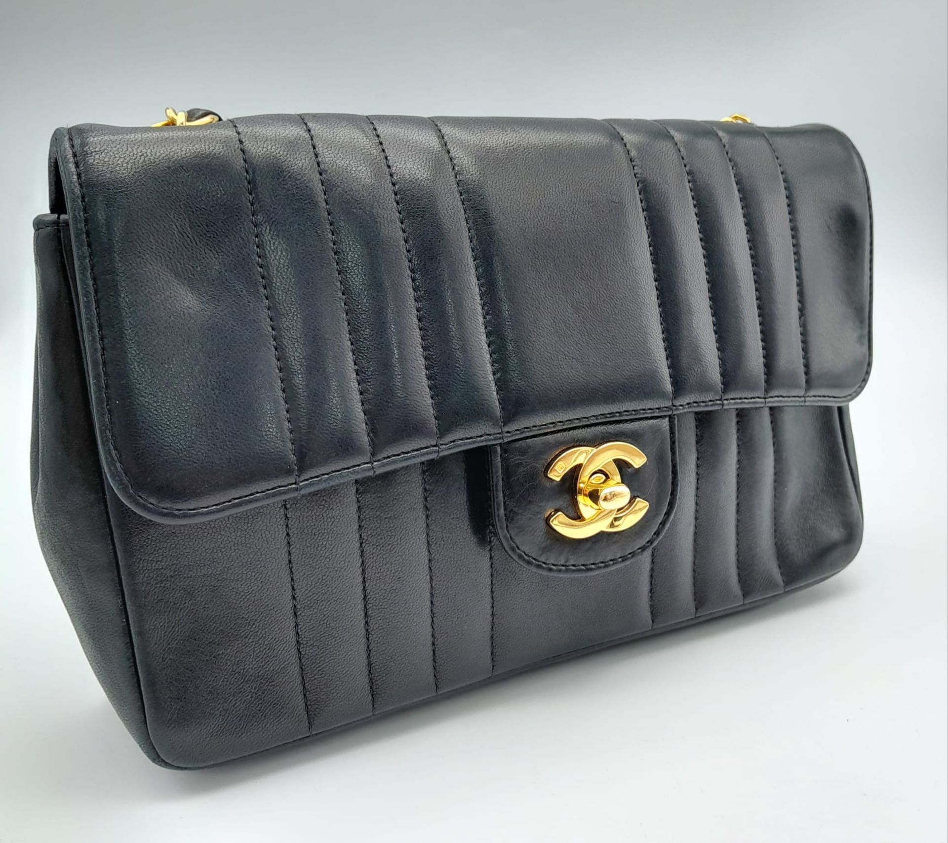 An Early 1990s Chanel Mademoiselle Classic Flap Chain Bag. Black lambskin leather. Gold plated - Image 4 of 17