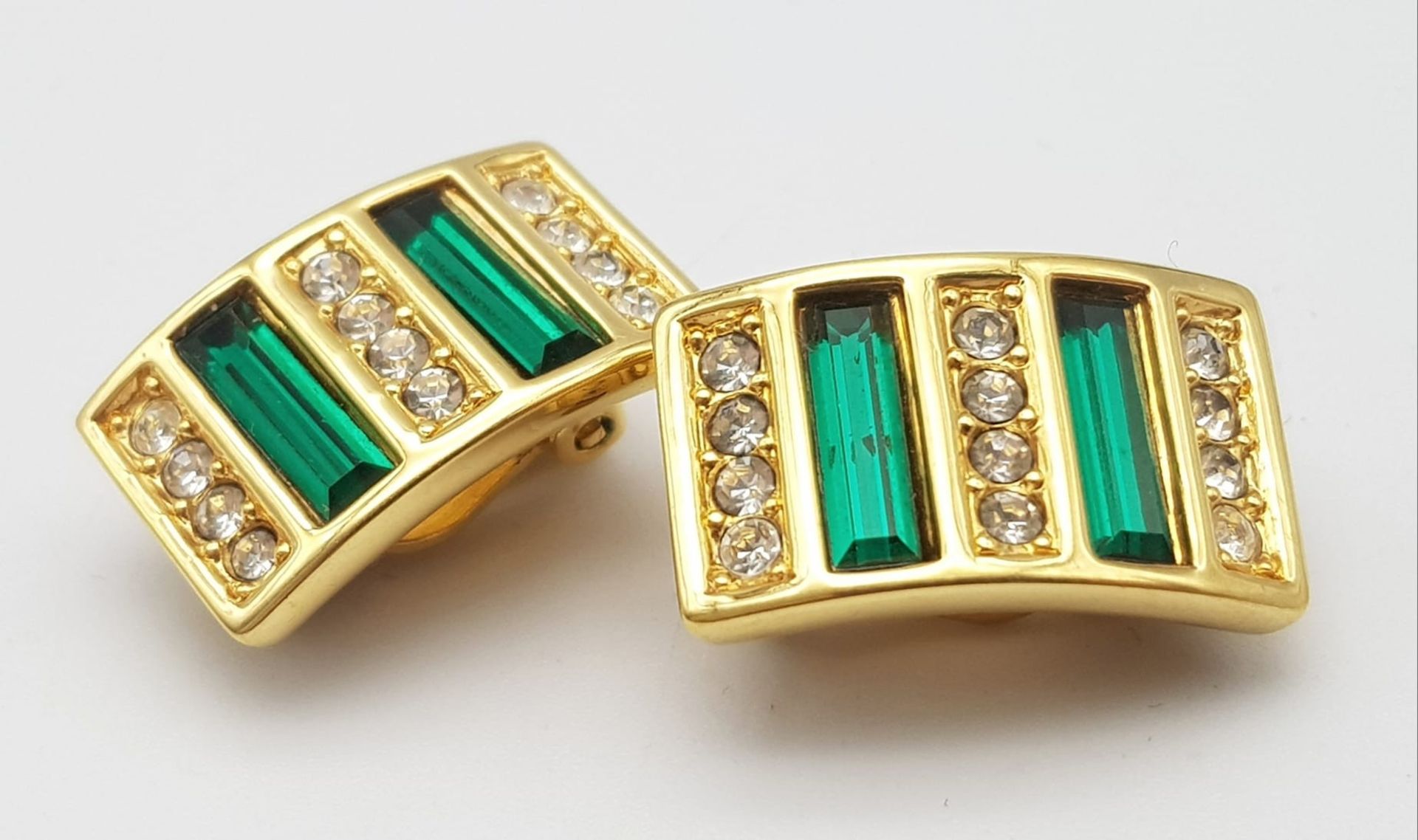 A Pair of Rare Vintage Swarovski Emerald Green and White Crystal Dress Earrings. Gilded setting.