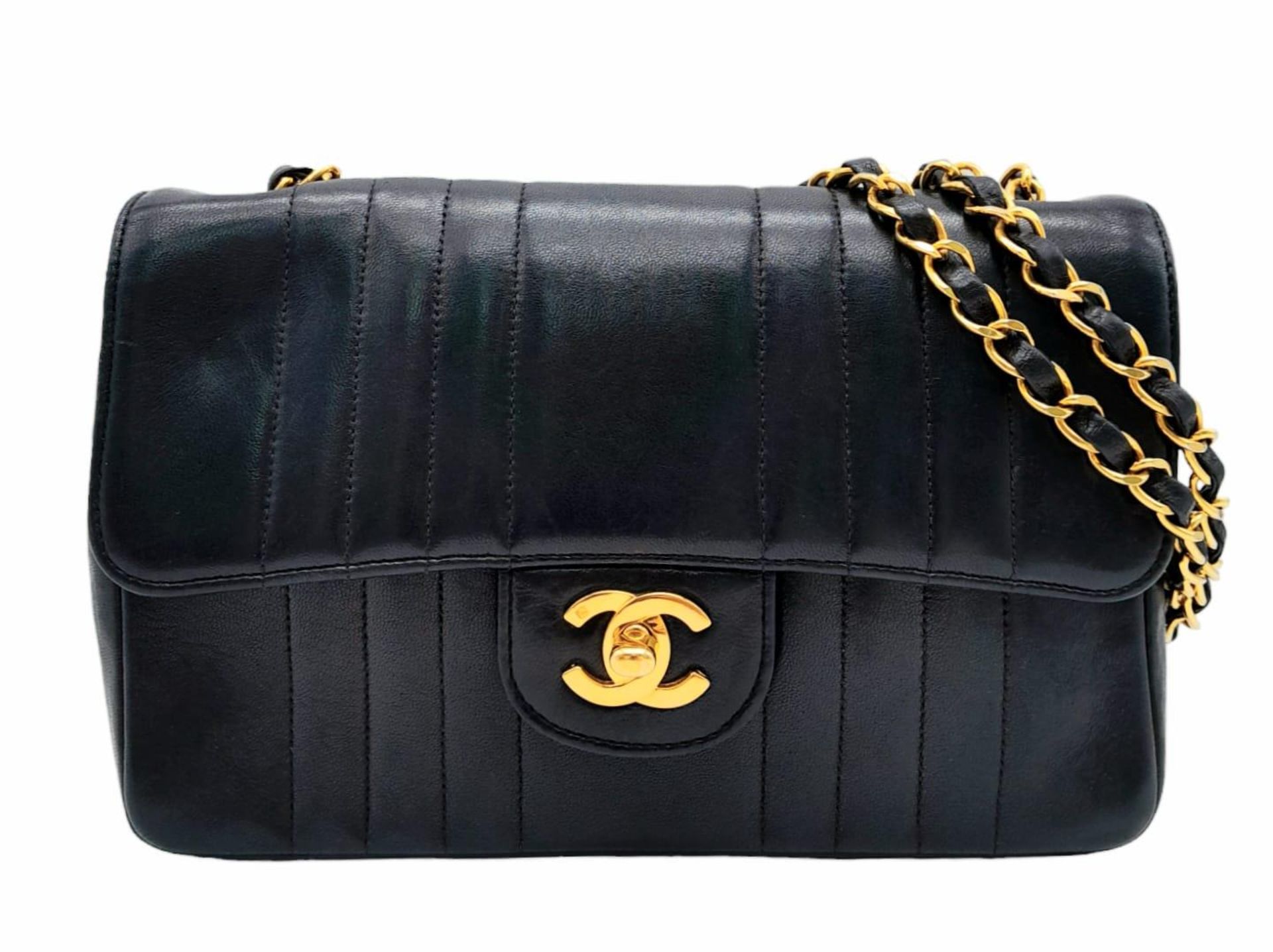 An Early 1990s Chanel Mademoiselle Classic Flap Chain Bag. Black lambskin leather. Gold plated - Image 2 of 17