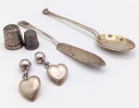 An Eclectic Mixed Silver Lot Including: 2 x thimbles, 1 x spoon, a pair of heart cufflinks and a