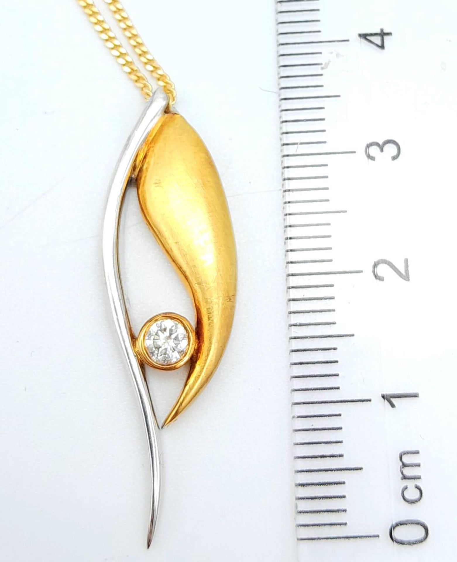 An 18K Bi Colour Gold Diamond Pendant on an 18K Yellow Gold Disappearing Necklace. 0.15ct diamond. - Image 7 of 11