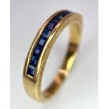 9K YELLOW GOLD SAPPHIRE CHANNEL SET BAND RING, WEIGHT 2.6G, SIZE M 1/2