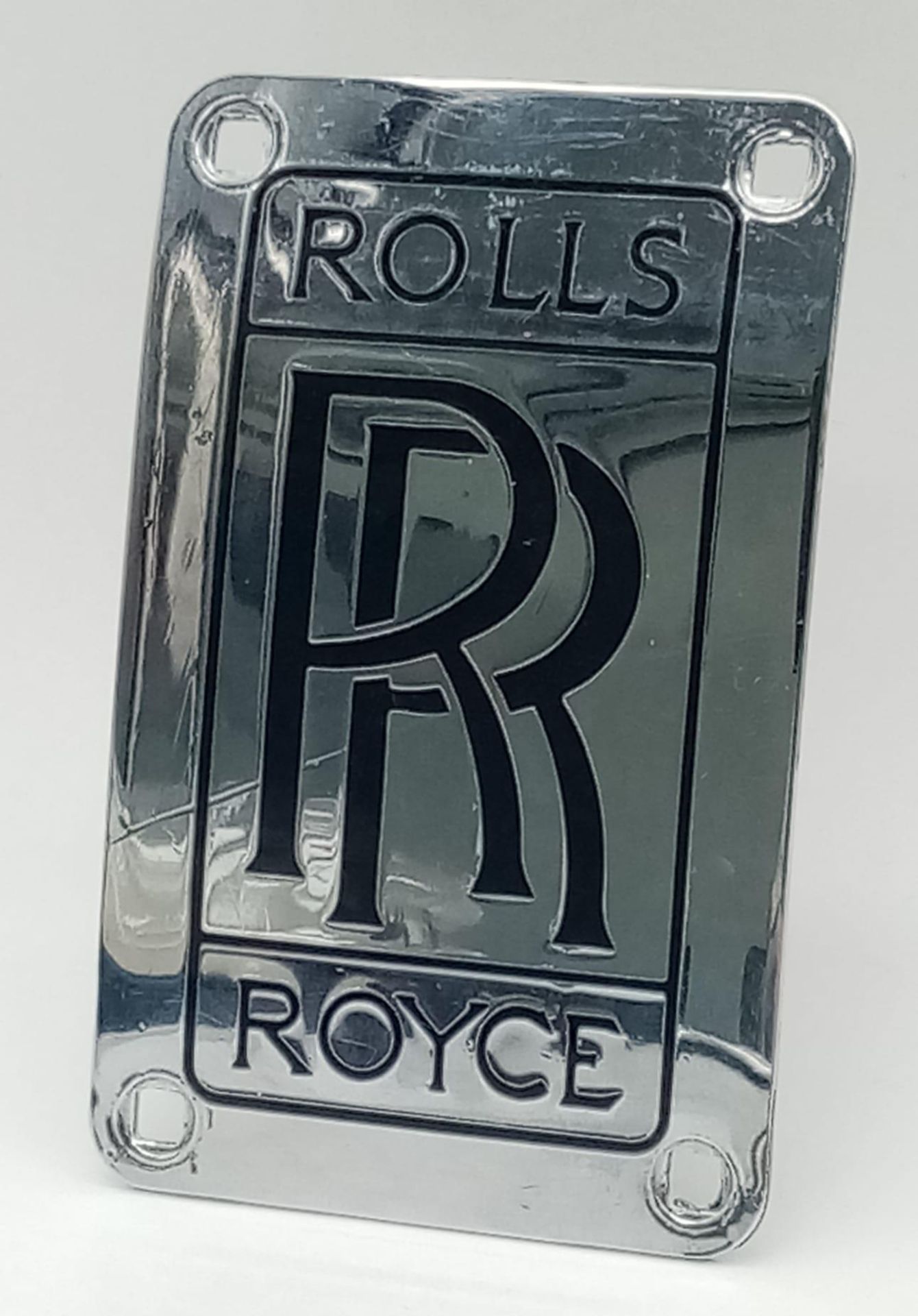 A Genuine Rolls Royce Car White Metal and Enamel Badge. Markings for RK 18357. 11cm x 7cm.