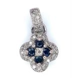 A 14K White Gold Sapphire and Diamond Small Clover Pendant. 2cm. 1.46g total weight.