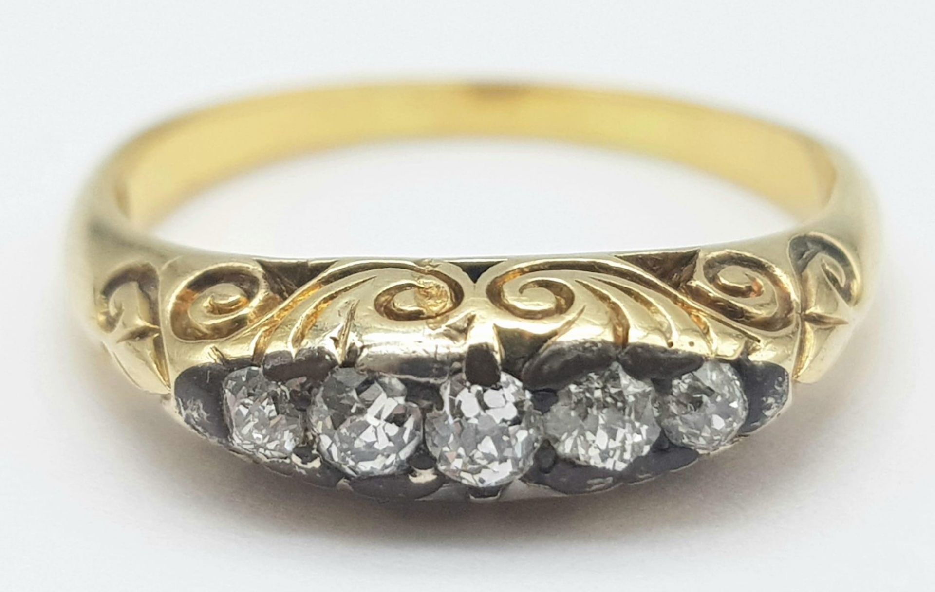 An 18K Yellow Gold Diamond Gypsy Ring. 0.15ctw diamonds. Size P. 4.9g total weight. - Image 3 of 5