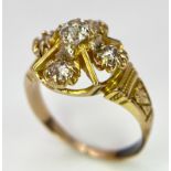 A 9K Yellow Gold (tested) Diamond Ring. Five round cut diamonds on a raised setting. Size N. 4.32g