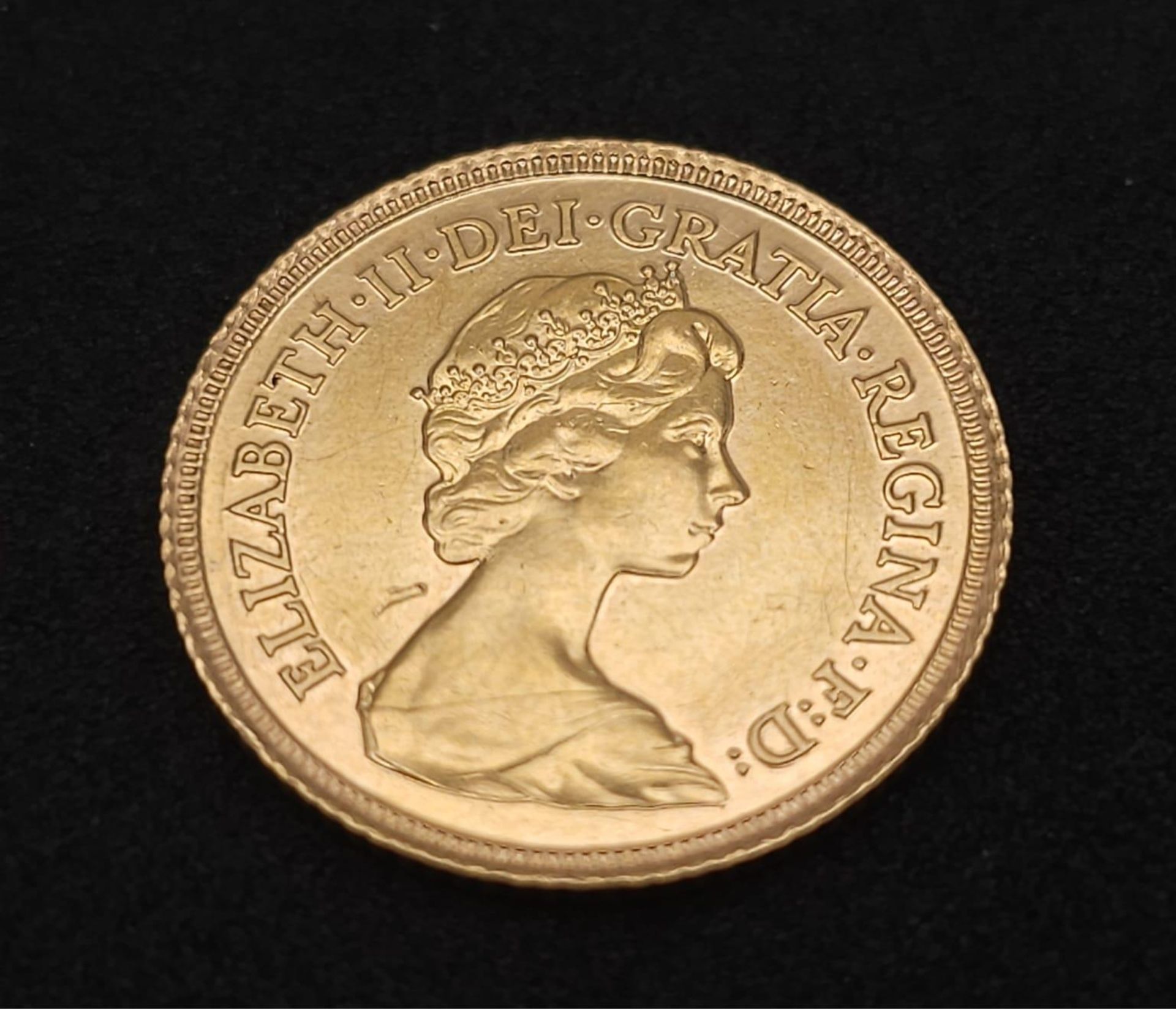 A 1982 Queen Elizabeth II 22K Gold Half Sovereign. - Image 2 of 5