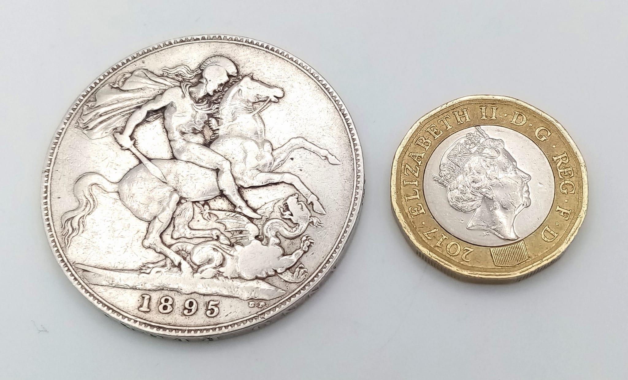 An 1895 Queen Victoria Silver Crown Coin. VF grade but please see photos - Image 3 of 3