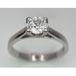 An 18K White Gold Diamond Solitaire Ring. A 0.58ct brilliant round cut diamond. Size K. 3.15g