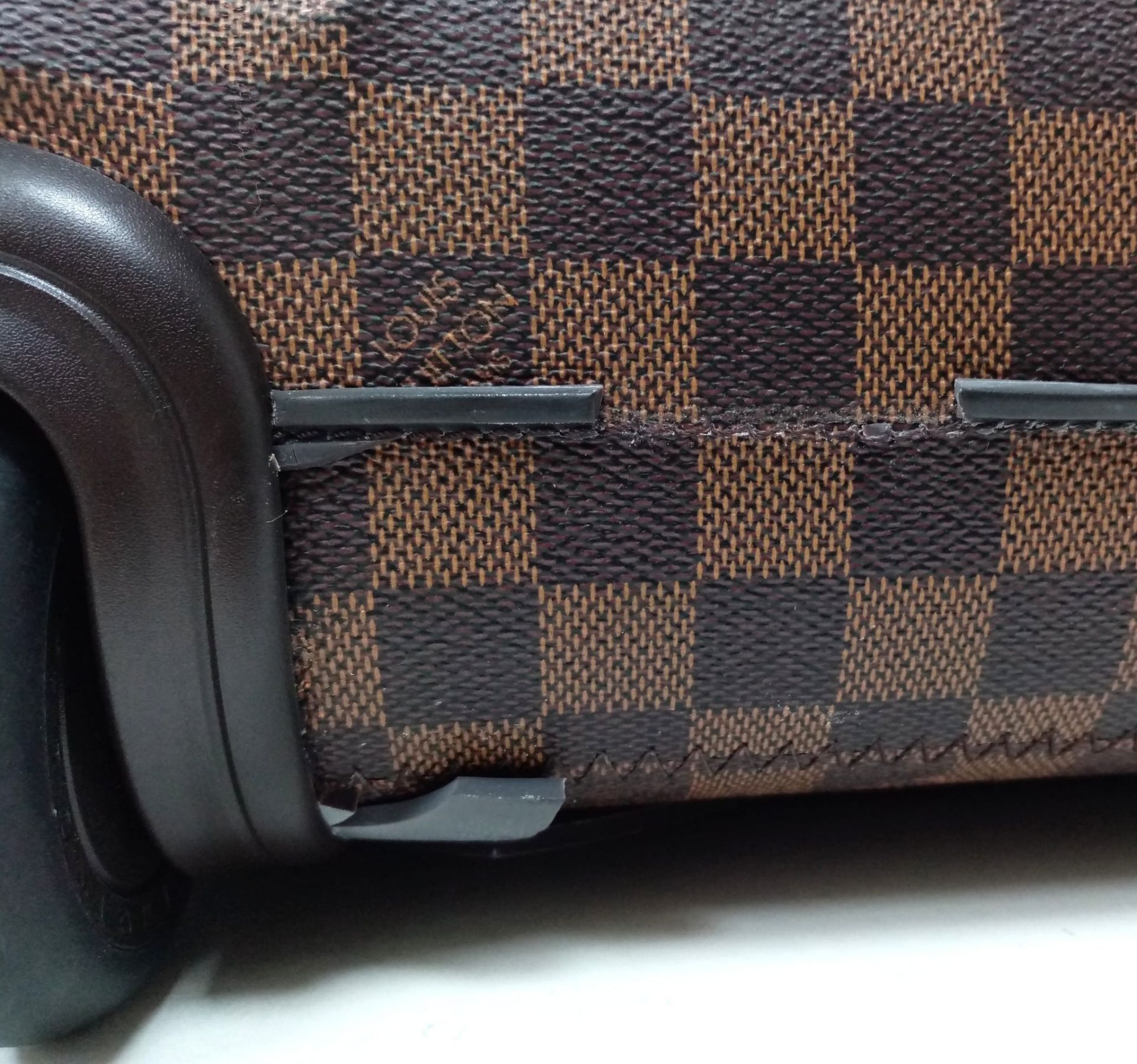 A Louis Vuitton Damier Ebene Eole Convertible Travel Bag. Leather exterior with gold-toned hardware, - Image 12 of 13