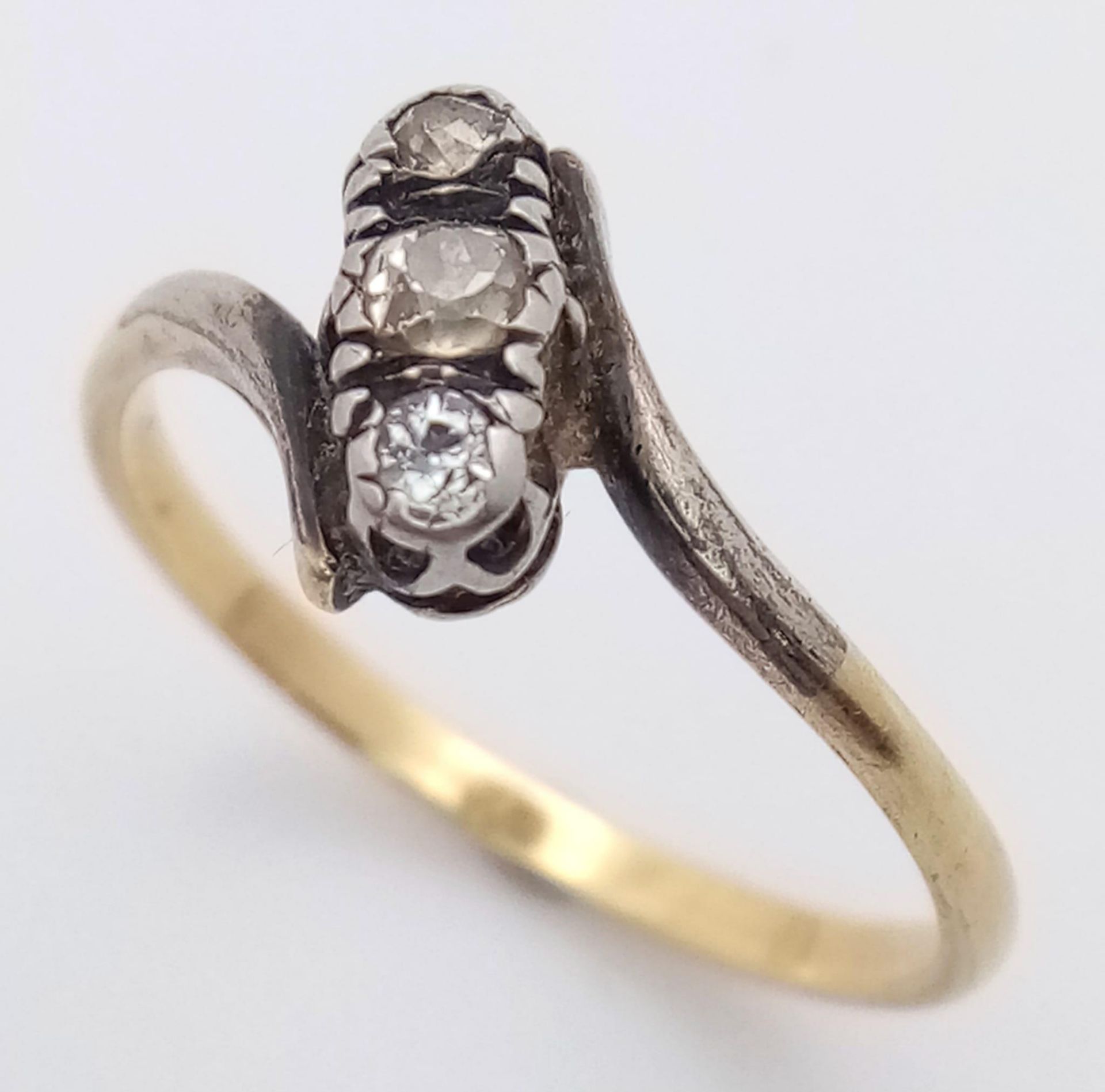 A Vintage 18K Yellow Gold (tested) Old-Cut Diamond Crossover Ring. Size O. 2.25g total weight. - Image 3 of 4