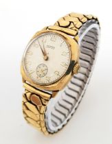 A WineGartens of London 9K Gold Cased Mechanical Gents Watch. Expandable gold plated strap. 9k