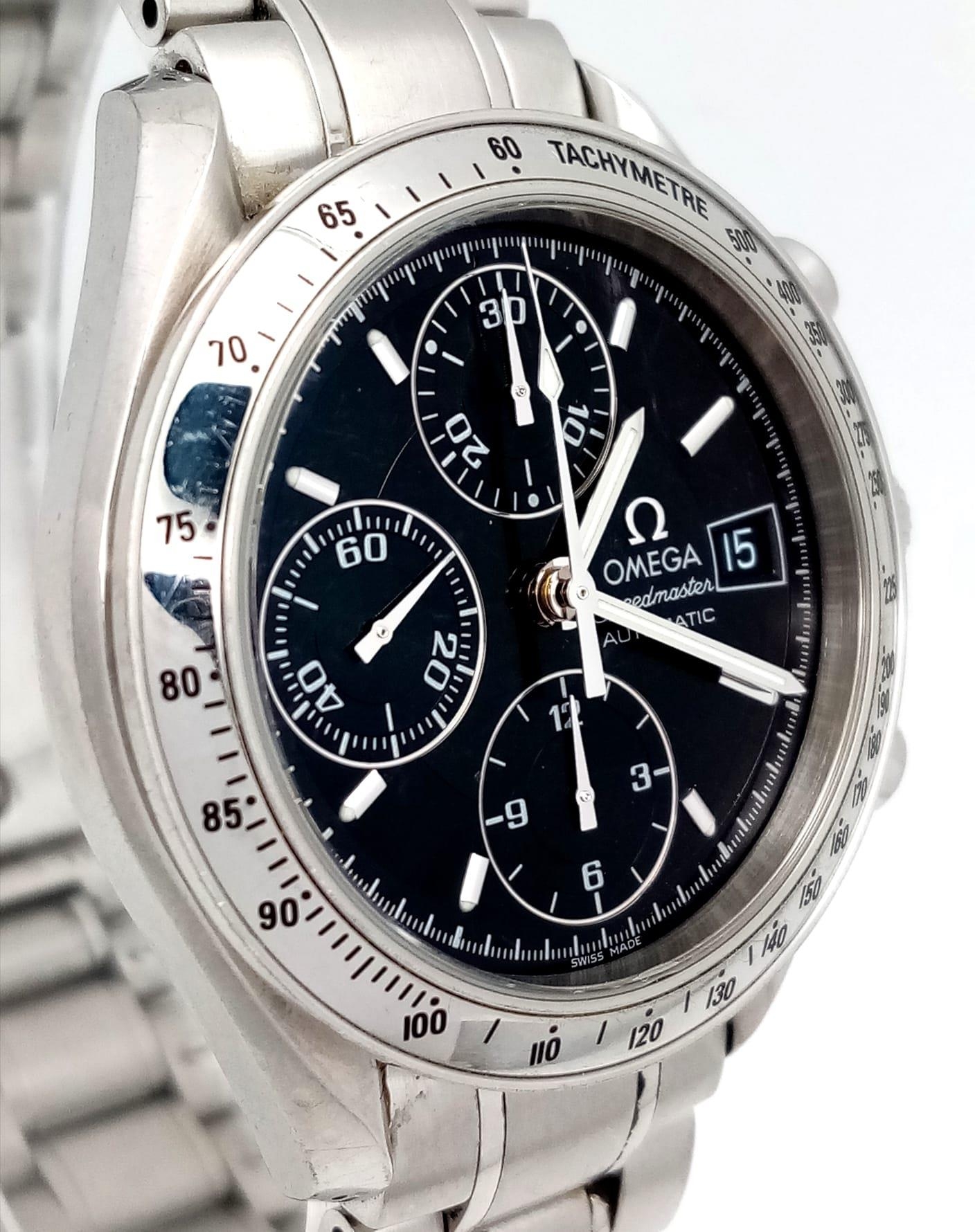 AN OMEGA "SPEEDMASTER" AUTOMATIC WATCH WITH 3 SUBDIALS , DATE BOX AND BLACK DIAL ALL SET IN - Image 2 of 9