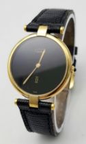 A Vintage (1980s) Must de Cartier Gold Plated Quartz Ladies Watch. Black leather strap. Gold