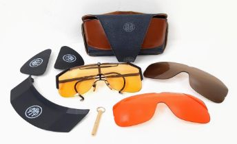 A Pair of Beretta Competition Glasses with Spare Lens Etc. Comes with case.