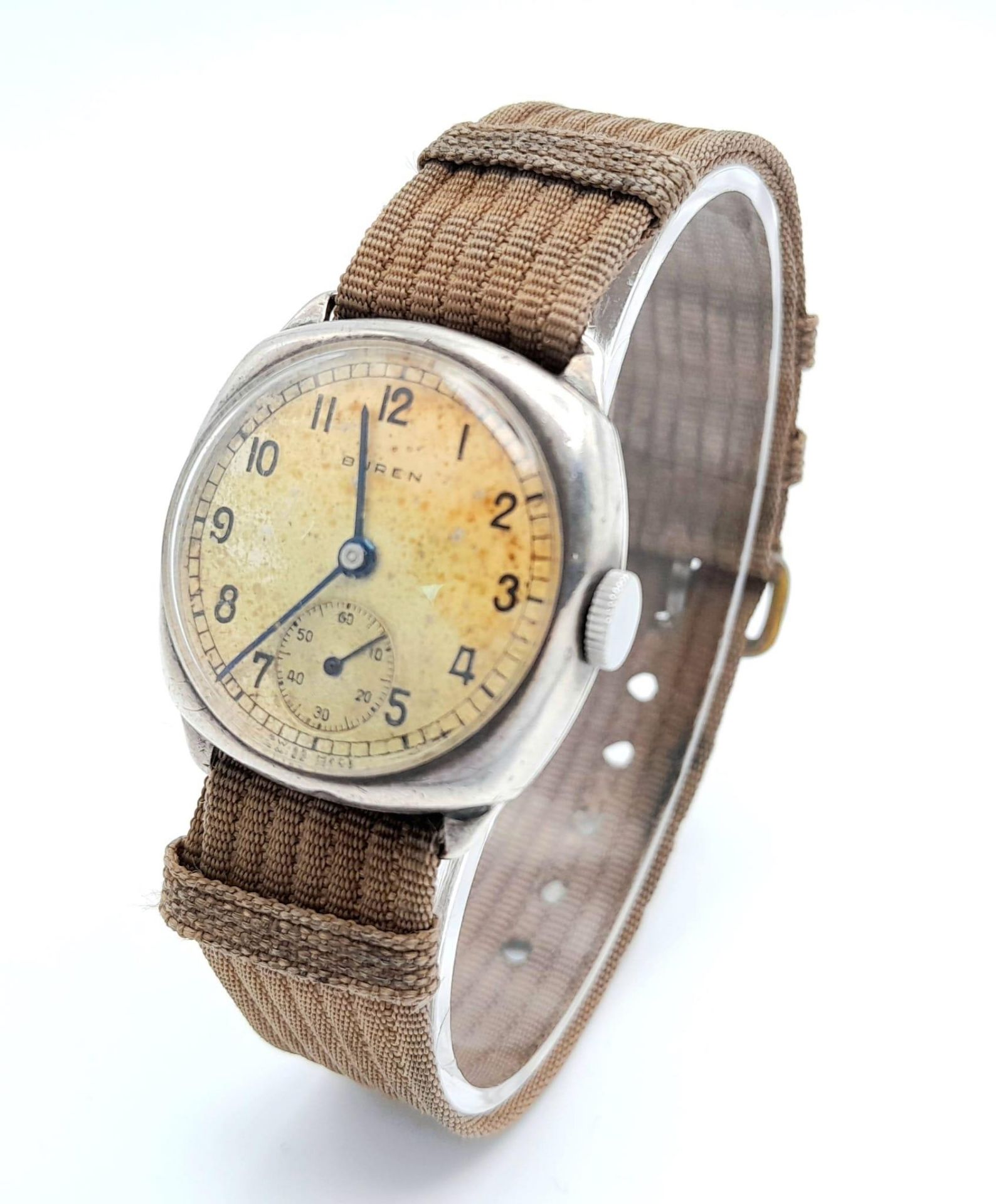 A Vintage Buren (1940s) Mechanical Gents Watch. Textile strap. Stainless steel case - 30mm. Patinaed