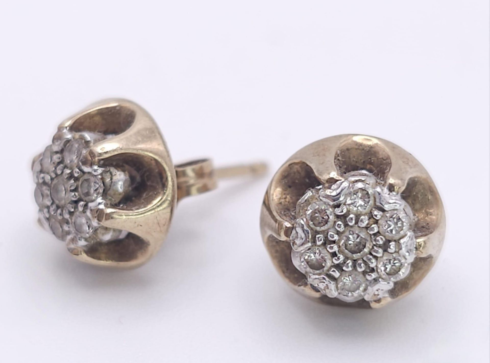 A Pair of Vintage 9K Yellow Gold and Diamond Stud Earrings. 3.3g total weight.
