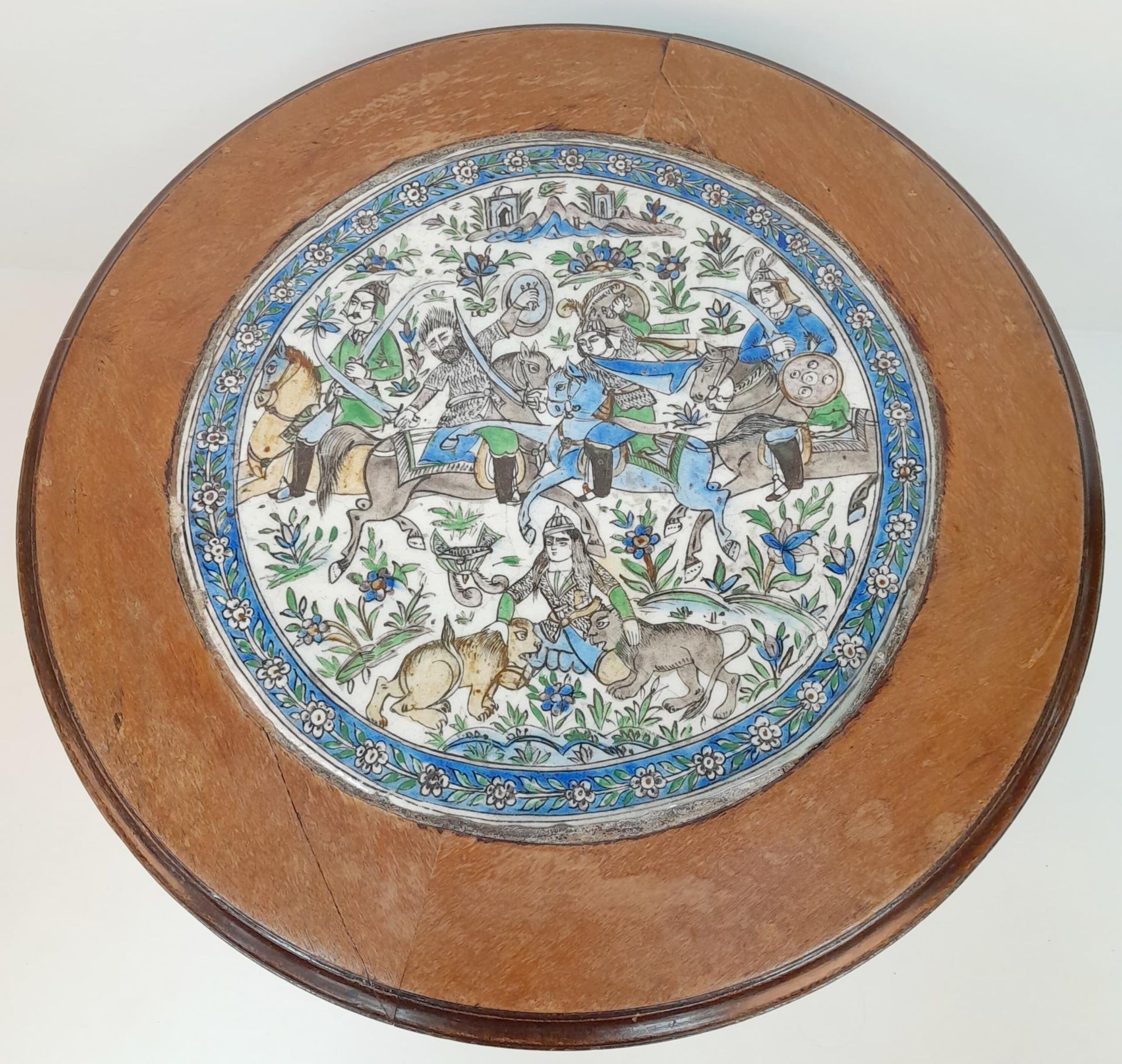 AN ANTIQUE SMALL QAJAR TABLE WITH CERAMIC TOP DEPICTING THE PERSIAN VICTORIES IN BATTLE . 51cms TALL - Bild 3 aus 5
