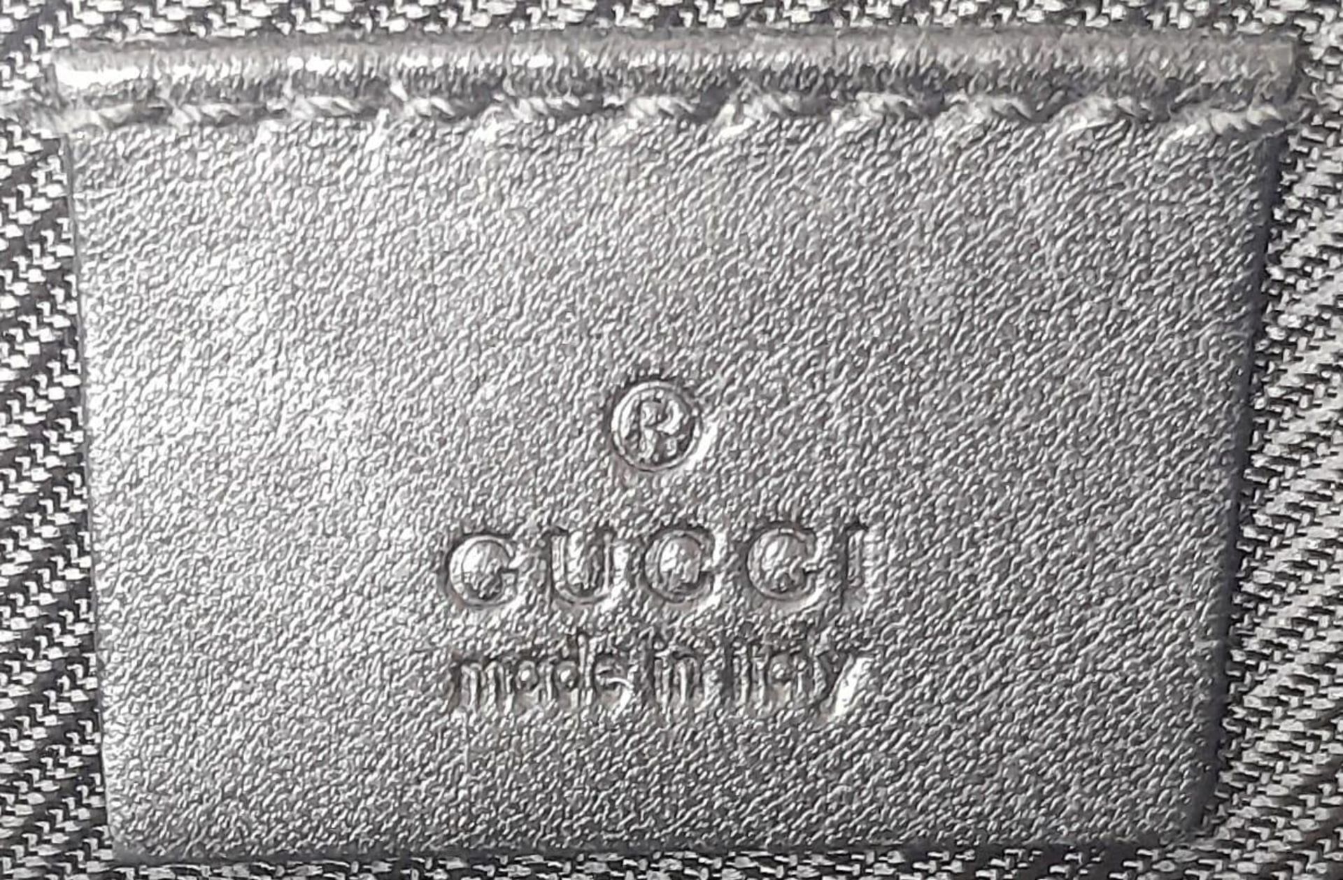 A Gucci Black Monogram Pochette Boat Bag. Textile exterior with black and silver-toned hardware, - Image 6 of 7