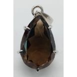 A Smoky Quartz 925 Silver Pendant. Pear cut. 7g. 3.5cm. Comes with a presentation case. Ref: Vo 1505