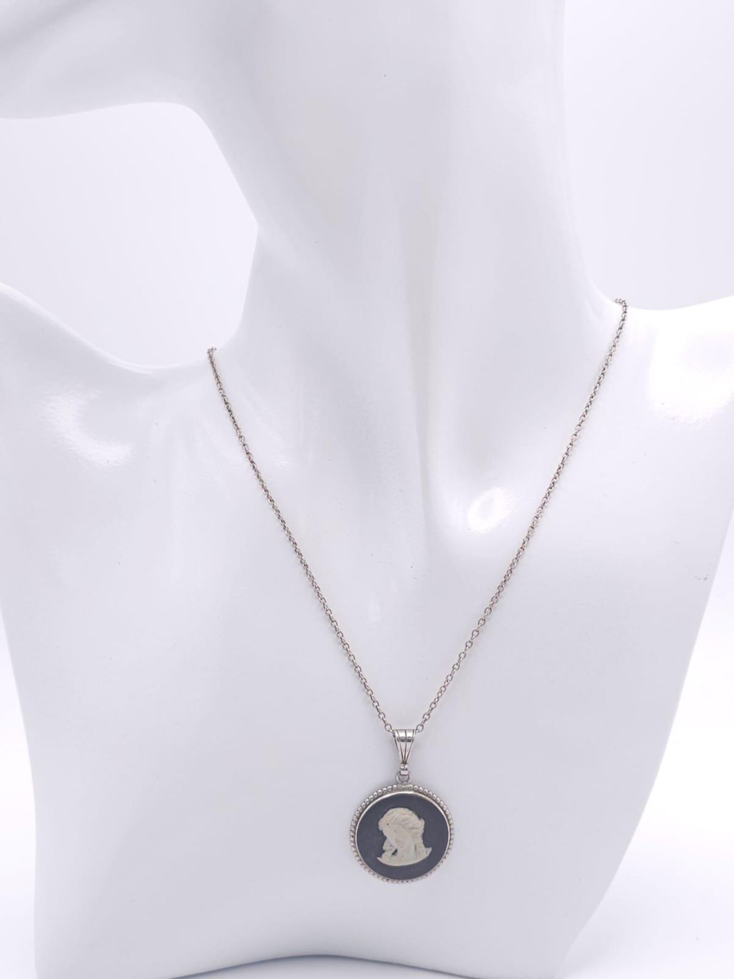 A sterling silver Cameo pendant on silver belcher chain. Total weight 5.3G. Total length 43cm. - Image 12 of 13