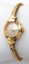 A Vintage Omega 18K Gold Ladies Watch. 18k gold bracelet and case - 17mm. Patinaed dial.