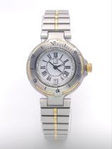 A Dunhill Quartz Ladies Watch. Two tone stainless steel bracelet and case - 29mm. White dial with