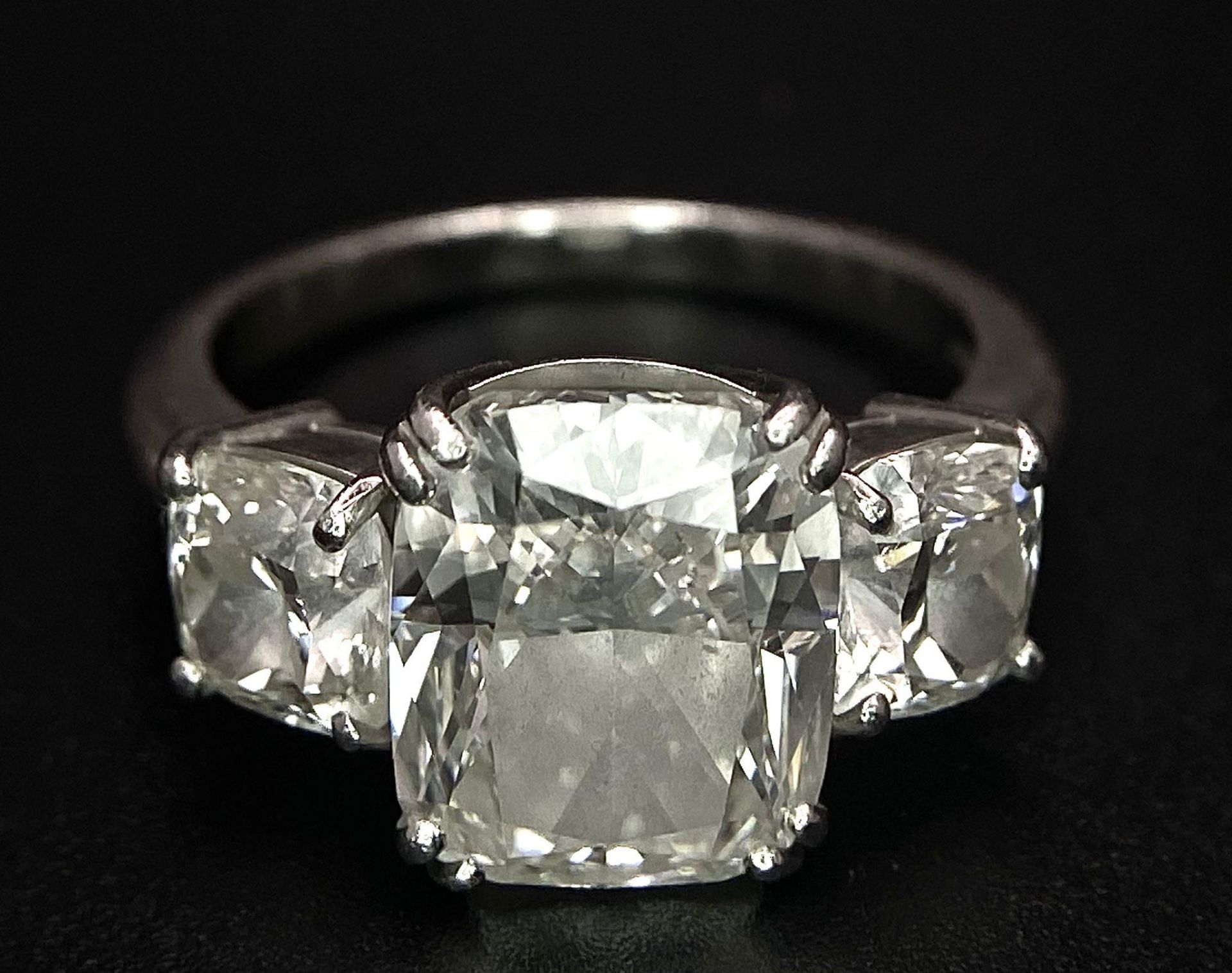 A Breathtaking 4.01ct GIA Certified Diamond Ring. A brilliant cushion cut 4.01ct central diamond