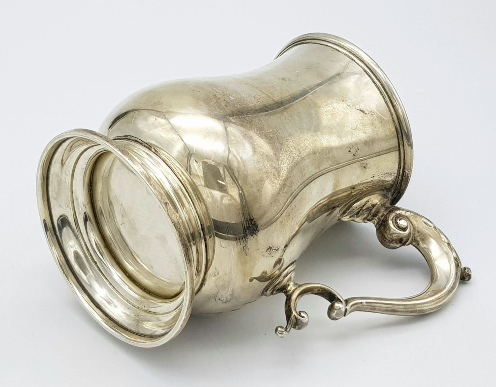 A Sterling Silver Tankard Given to the Thrusters! Hourglass design with an ornate handle. - Image 7 of 14