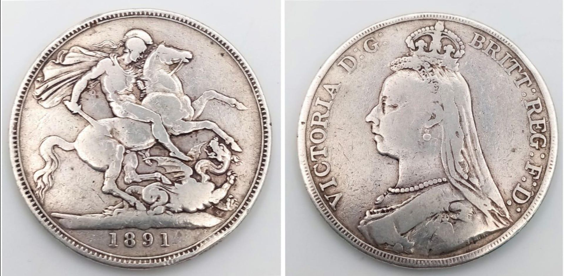 An 1891 Queen Victoria Silver Crown. VF grade but please see photos.