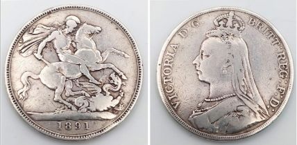 An 1891 Queen Victoria Silver Crown. VF grade but please see photos.