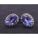 A Stunning Pair of White Gold, Tanzanite and Diamond Stud Earrings. 2.3g total weight