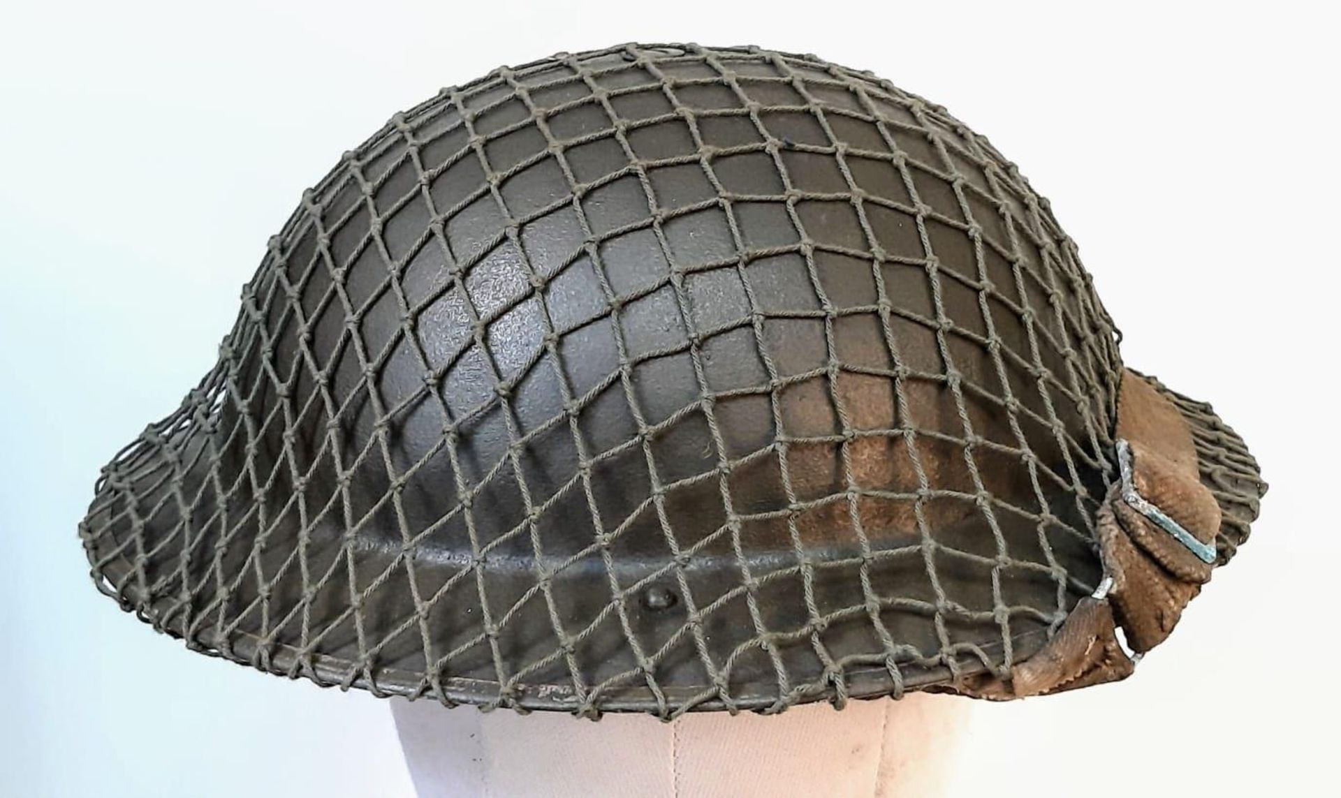 WW2 British MK II Helmet with Cam Net and 1944 Dated (D-Day) Field Dressing. - Image 3 of 5