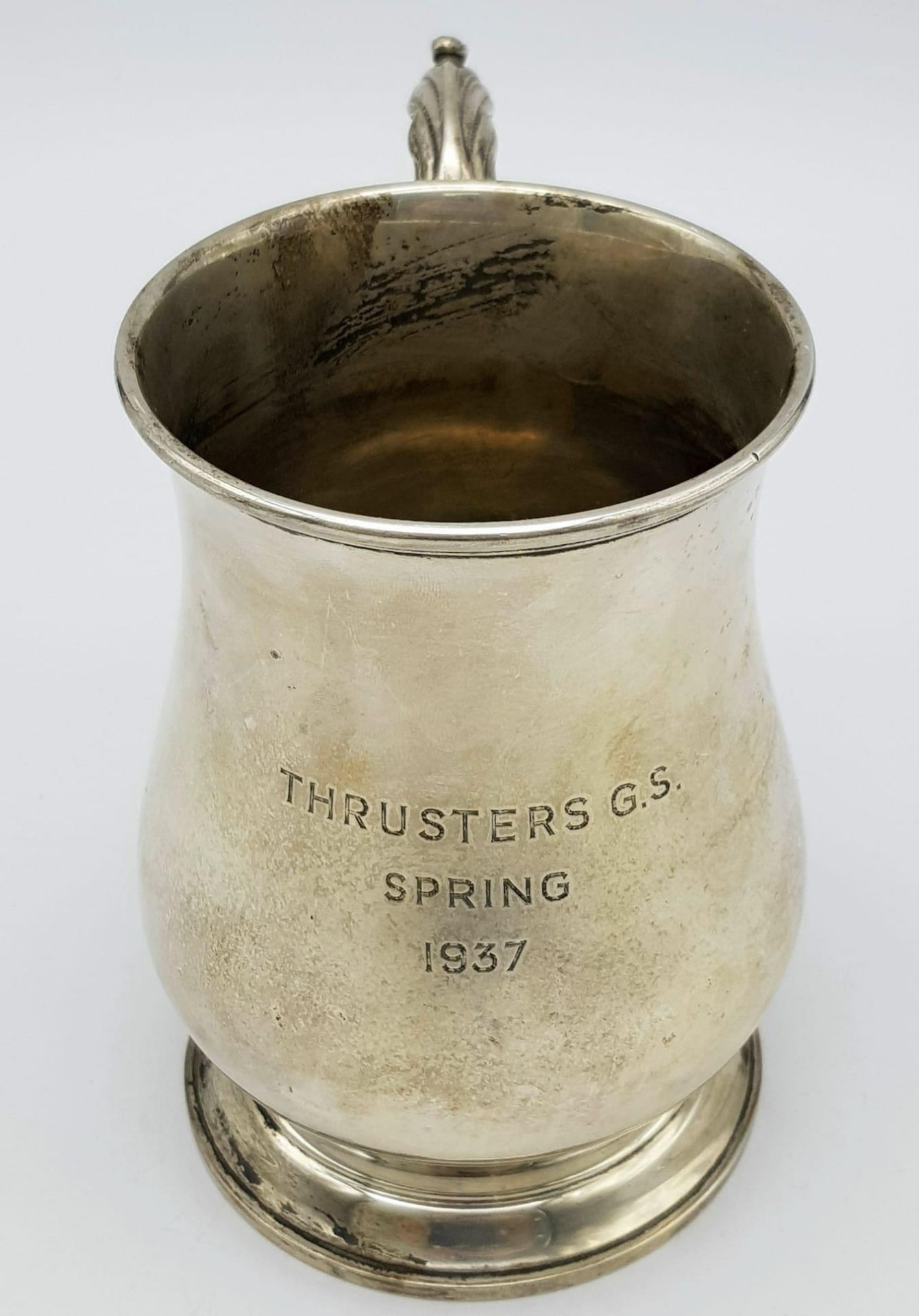 A Sterling Silver Tankard Given to the Thrusters! Hourglass design with an ornate handle. - Image 5 of 14