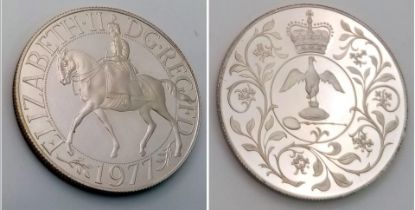 A 1977 Silver Proof Elizabeth II Crown Coin.