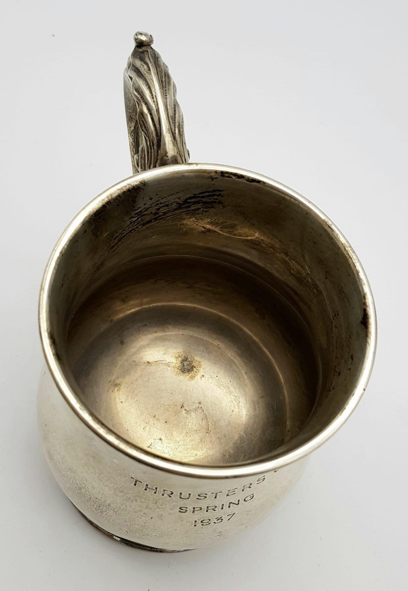 A Sterling Silver Tankard Given to the Thrusters! Hourglass design with an ornate handle. - Image 10 of 14