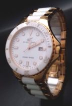 A Klaus Kobec Ceramic Wicked Quartz Watch. White ceramic and gilded stainless steel bracelet and